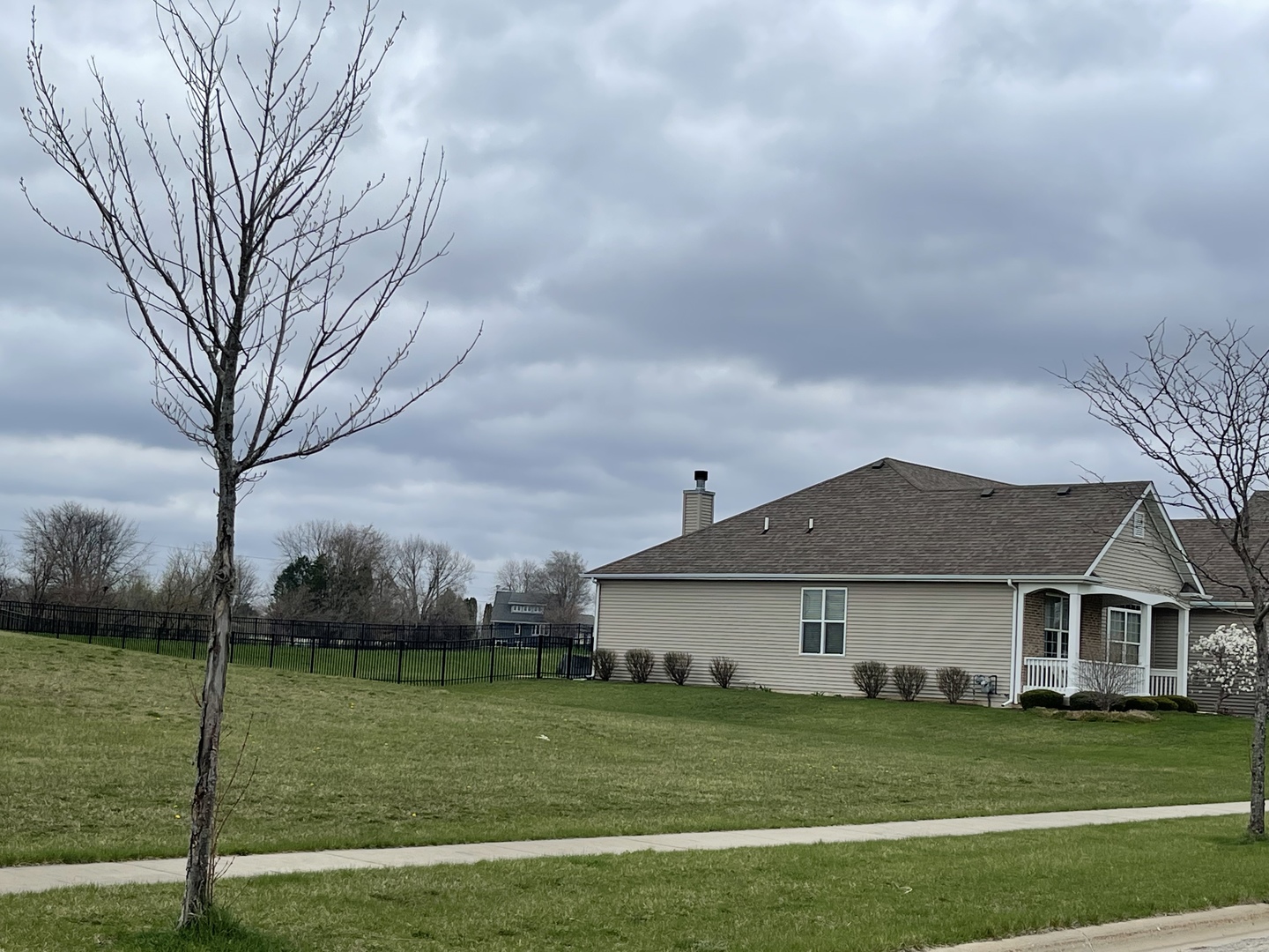 2201 Tyler Trail McHenry, IL 60051 - Photo 2 of 3 a front view of a house with garden