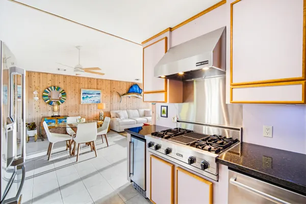 a outdoor space with lots of furniture and wooden floor