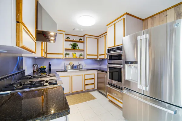 a view of a house with pool on the floor