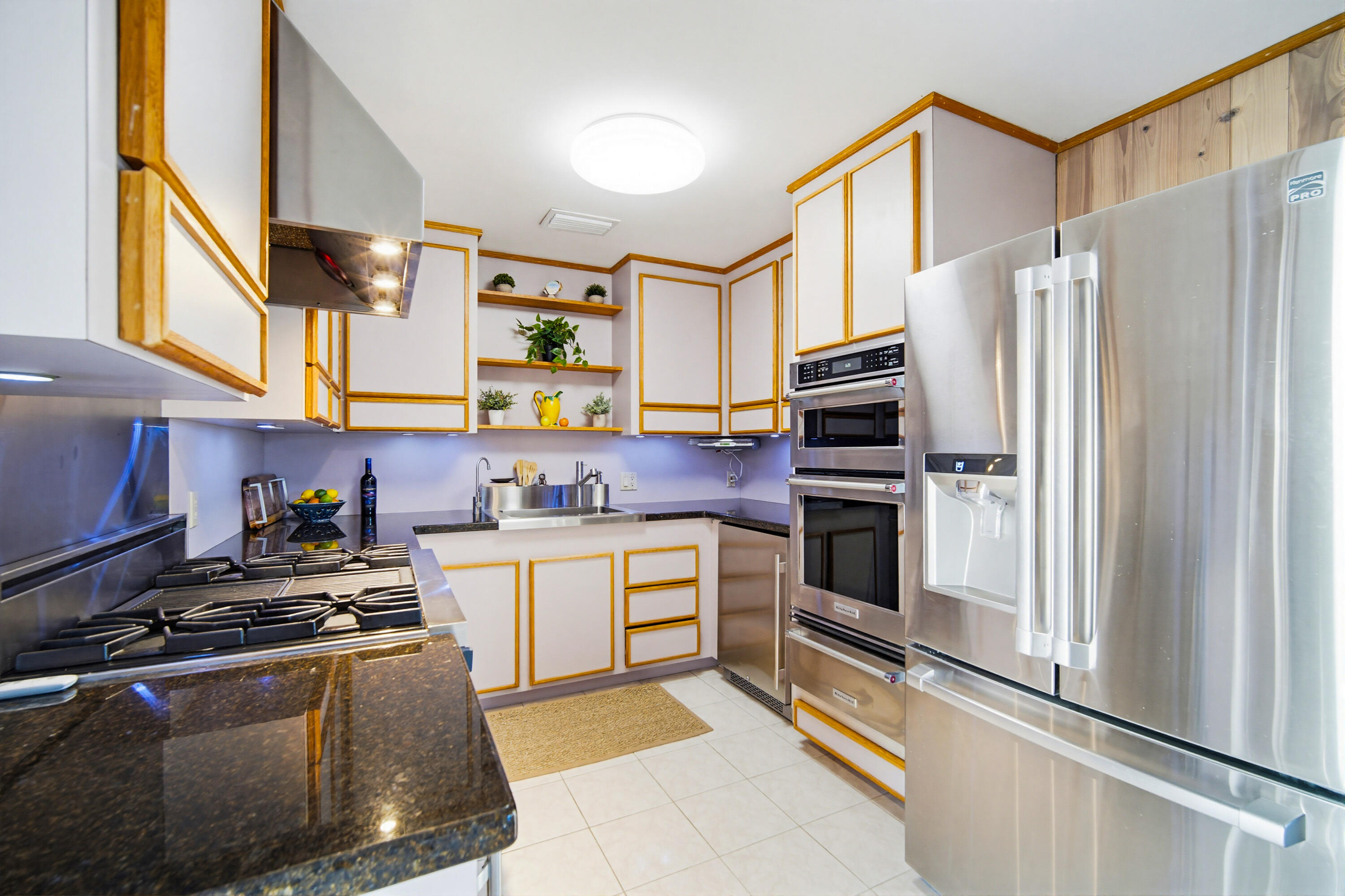403 Indies Road Summerland Key, FL 33042 - Photo 18 of 68 a kitchen with stainless steel appliances a stove a sink and a refrigerator