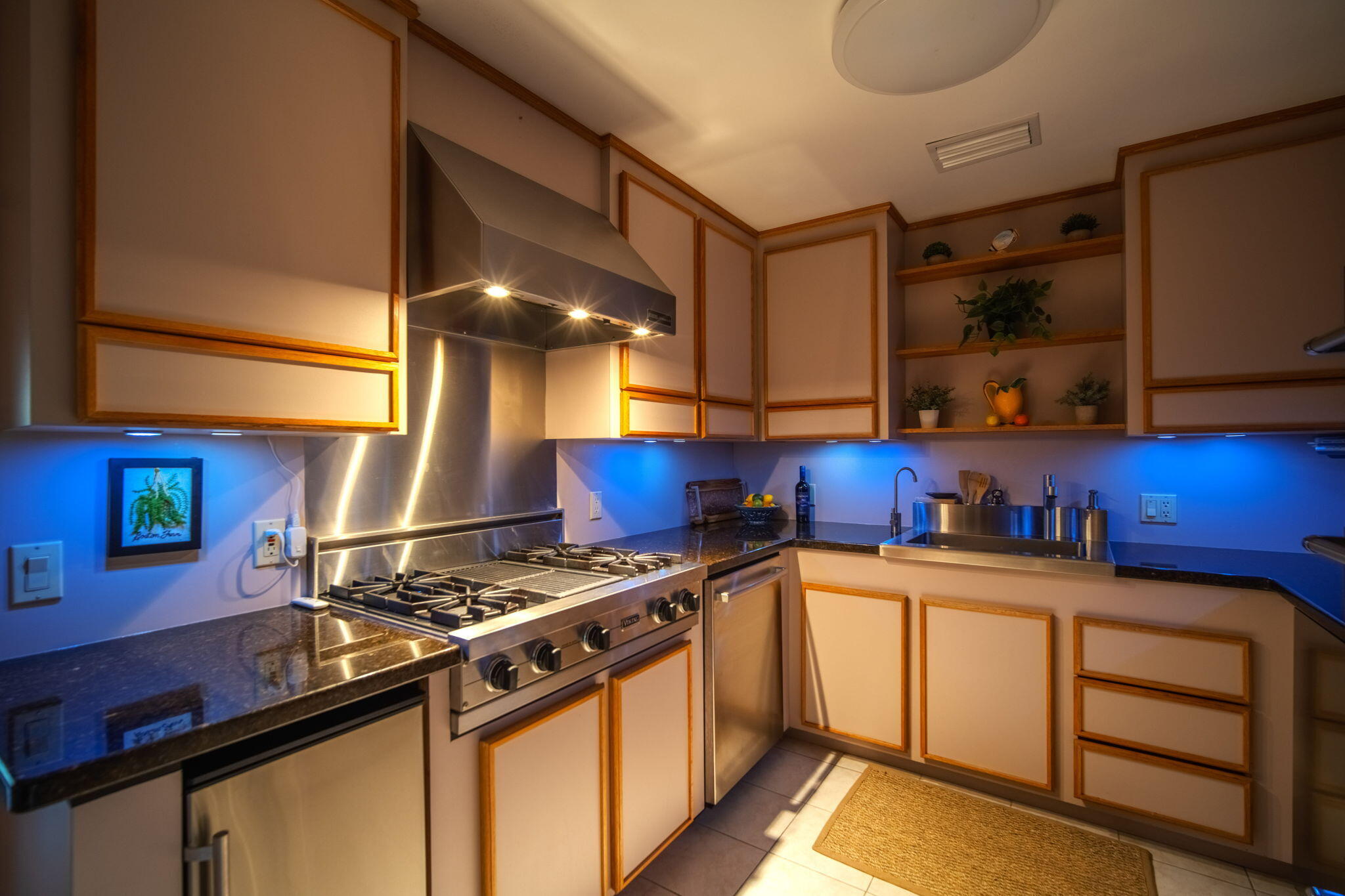 403 Indies Road Summerland Key, FL 33042 - Photo 19 of 68 a kitchen with granite countertop a stove and cabinets