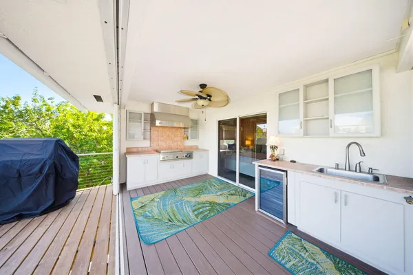 an aerial view of a house with a ocean view
