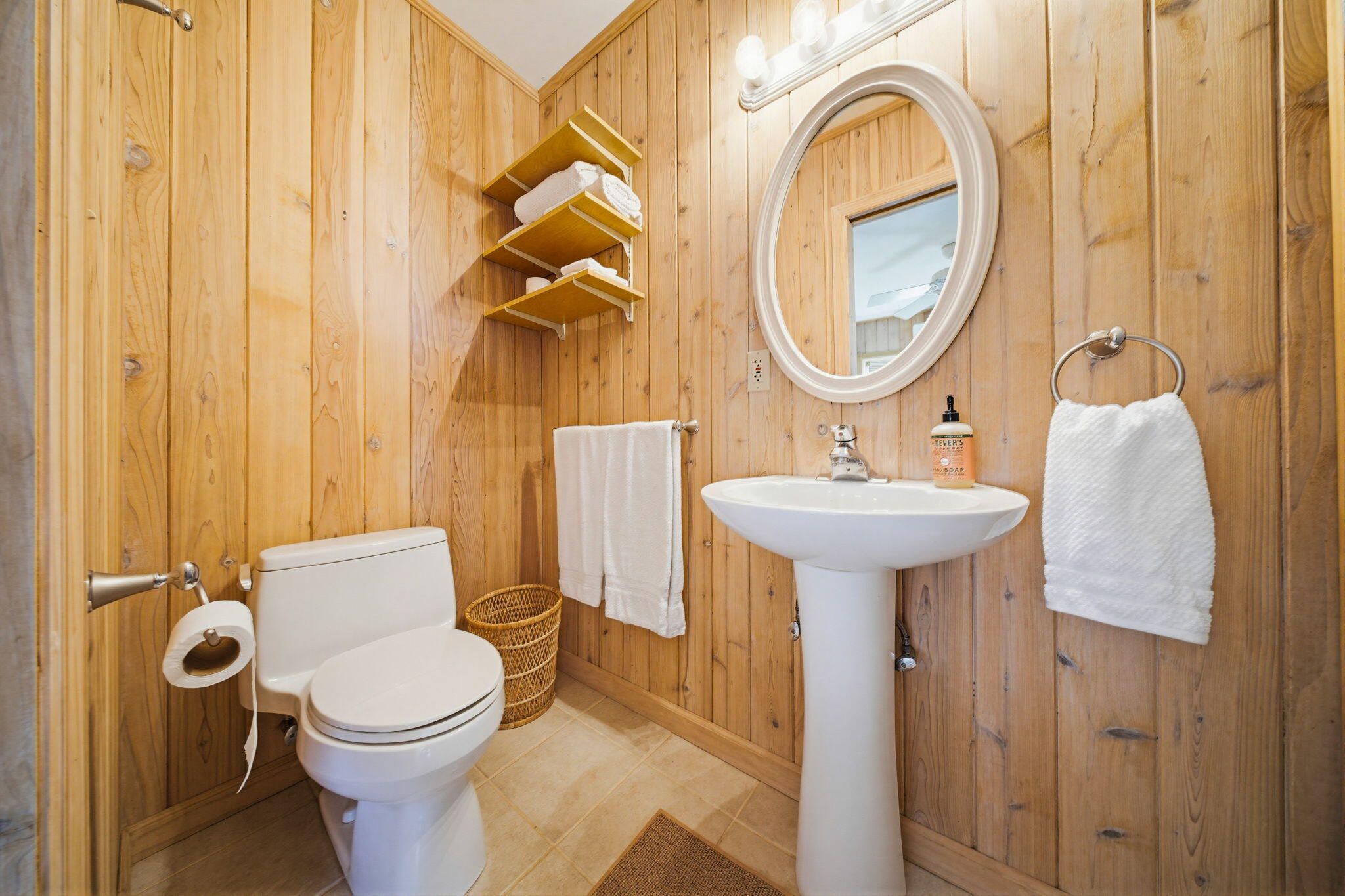 403 Indies Road Summerland Key, FL 33042 - Photo 35 of 68 a bathroom with a toilet sink and mirror