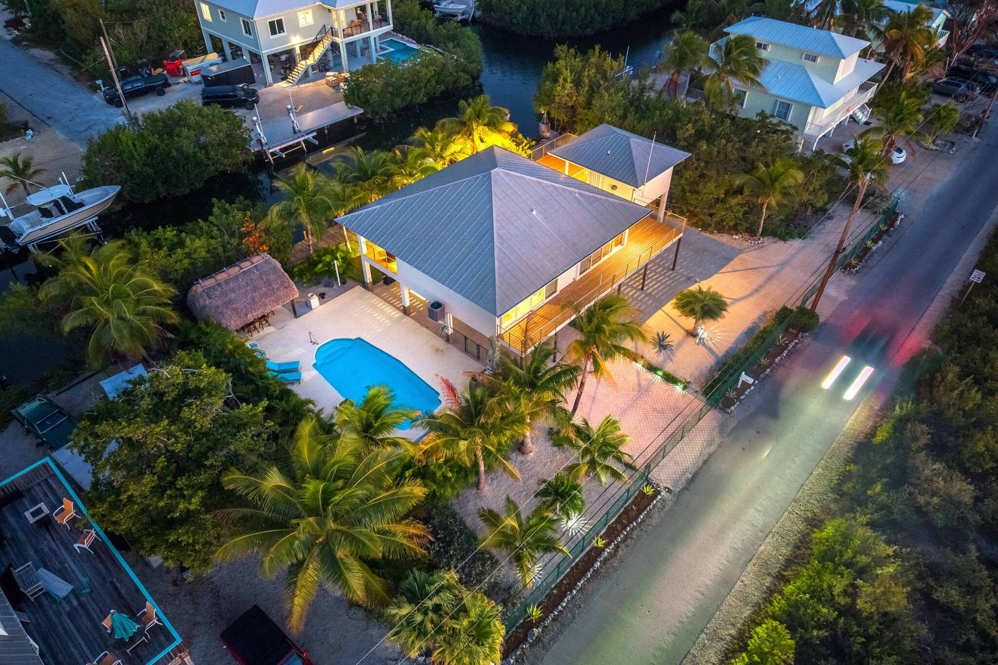403 Indies Road Summerland Key, FL 33042 - Photo 53 of 68 an aerial view of a house with a yard and garden