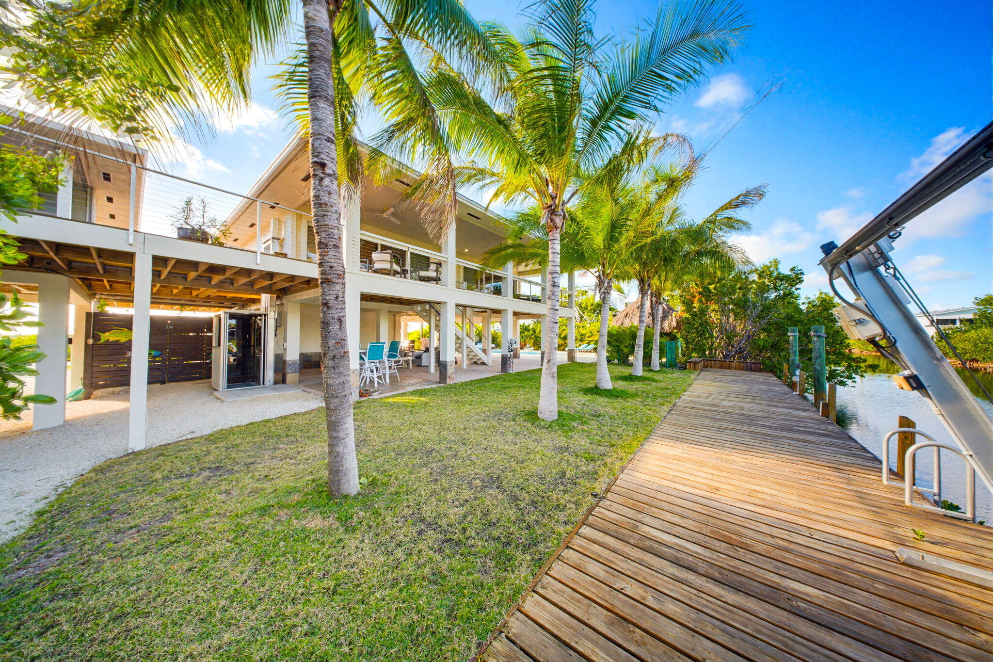 403 Indies Road Summerland Key, FL 33042 - Photo 6 of 68 a view of a park with swings and a table