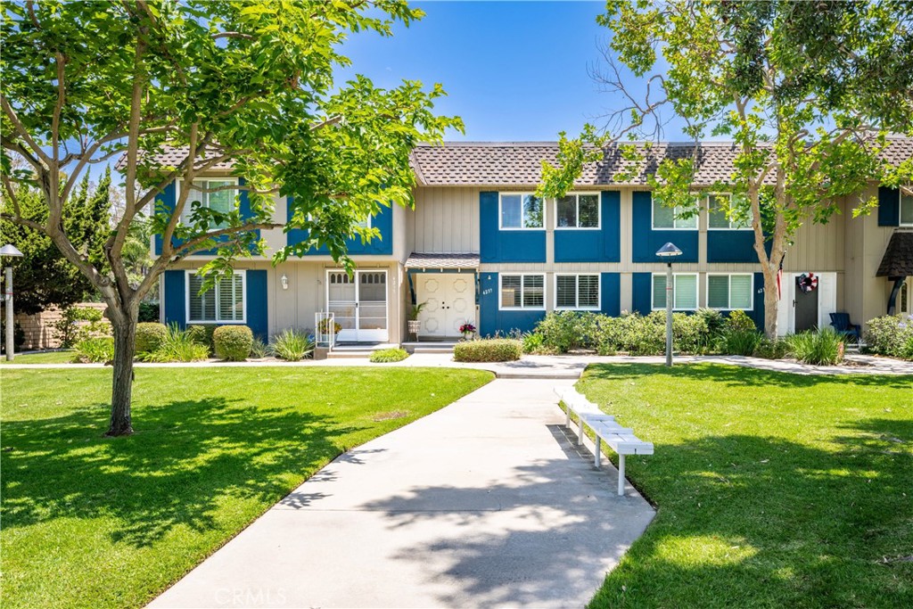 4237 Larwin Avenue Cypress, CA 90630 - Photo 3 of 48 a view of a house with a yard patio and swimming pool