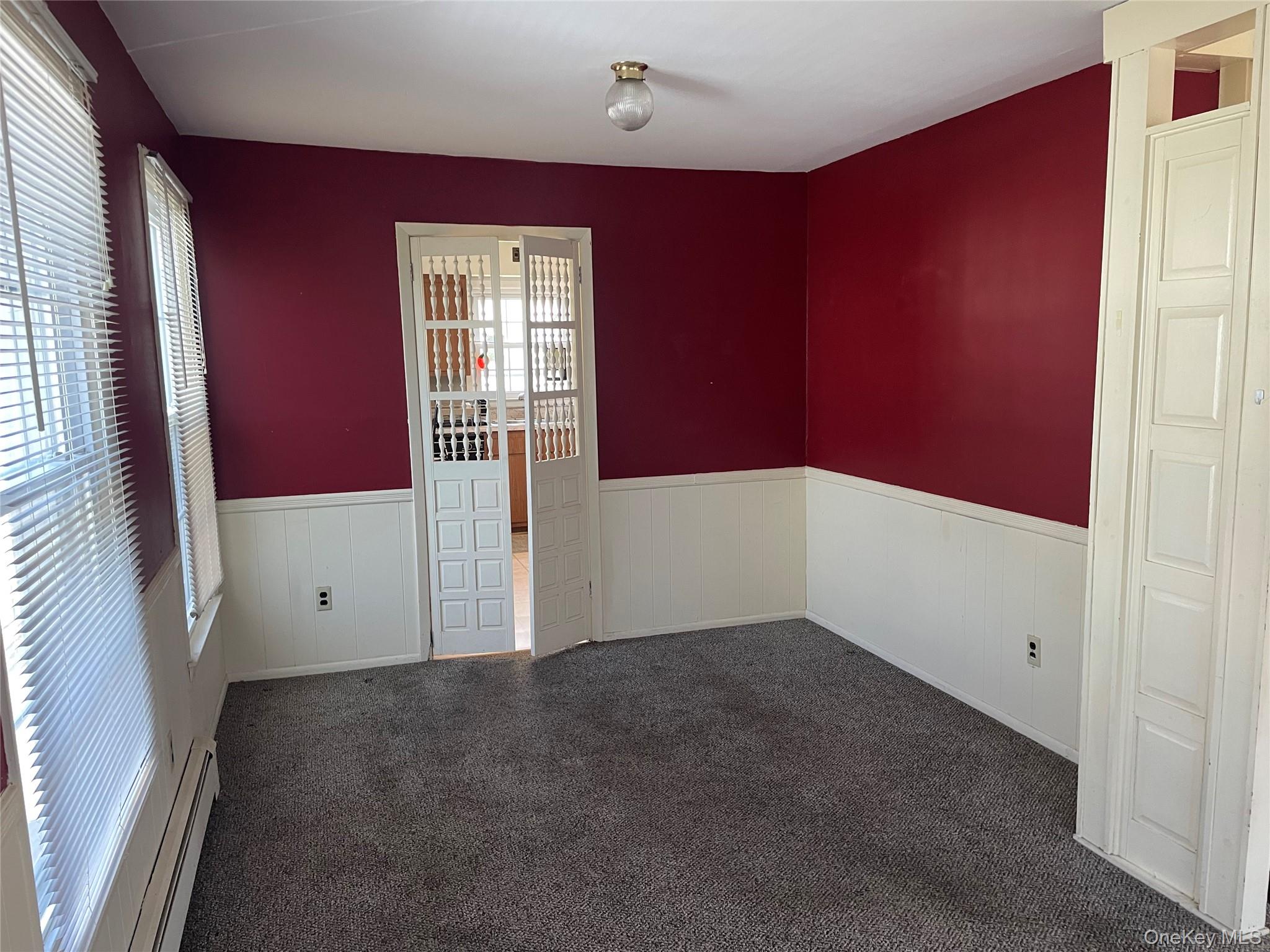 146-148 Ridge Street Pearl River, NY 10965 - Photo 9 of 19 UL Formal Dining Room, carpet over hardwood floor