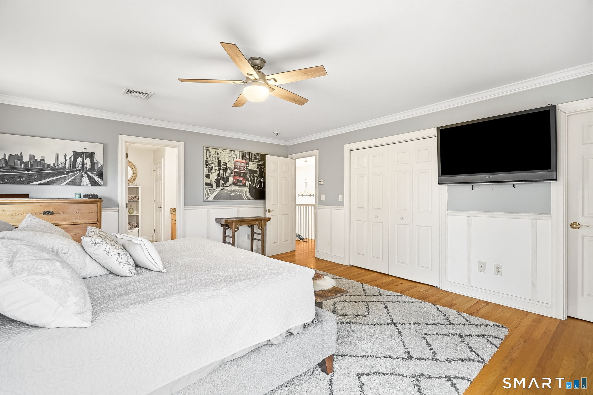 80 3rd Avenue Stratford, CT 06615 - Photo 23 of 40 a bedroom with a large bed and a flat screen tv