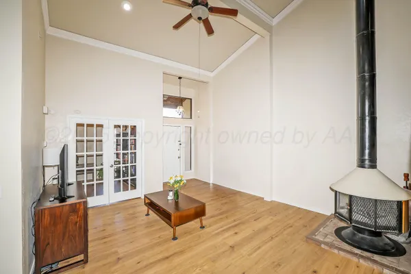a living room with furniture and a window