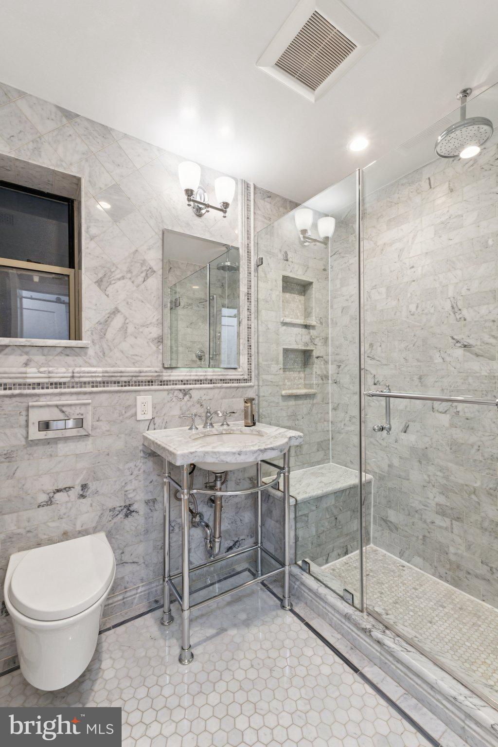 4707 Connecticut Avenue Northwest, Unit 211 & 213 Washington, DC 20008 - Photo 13 of 43 Gorgeous Marble Primary Bath with Heated Floor