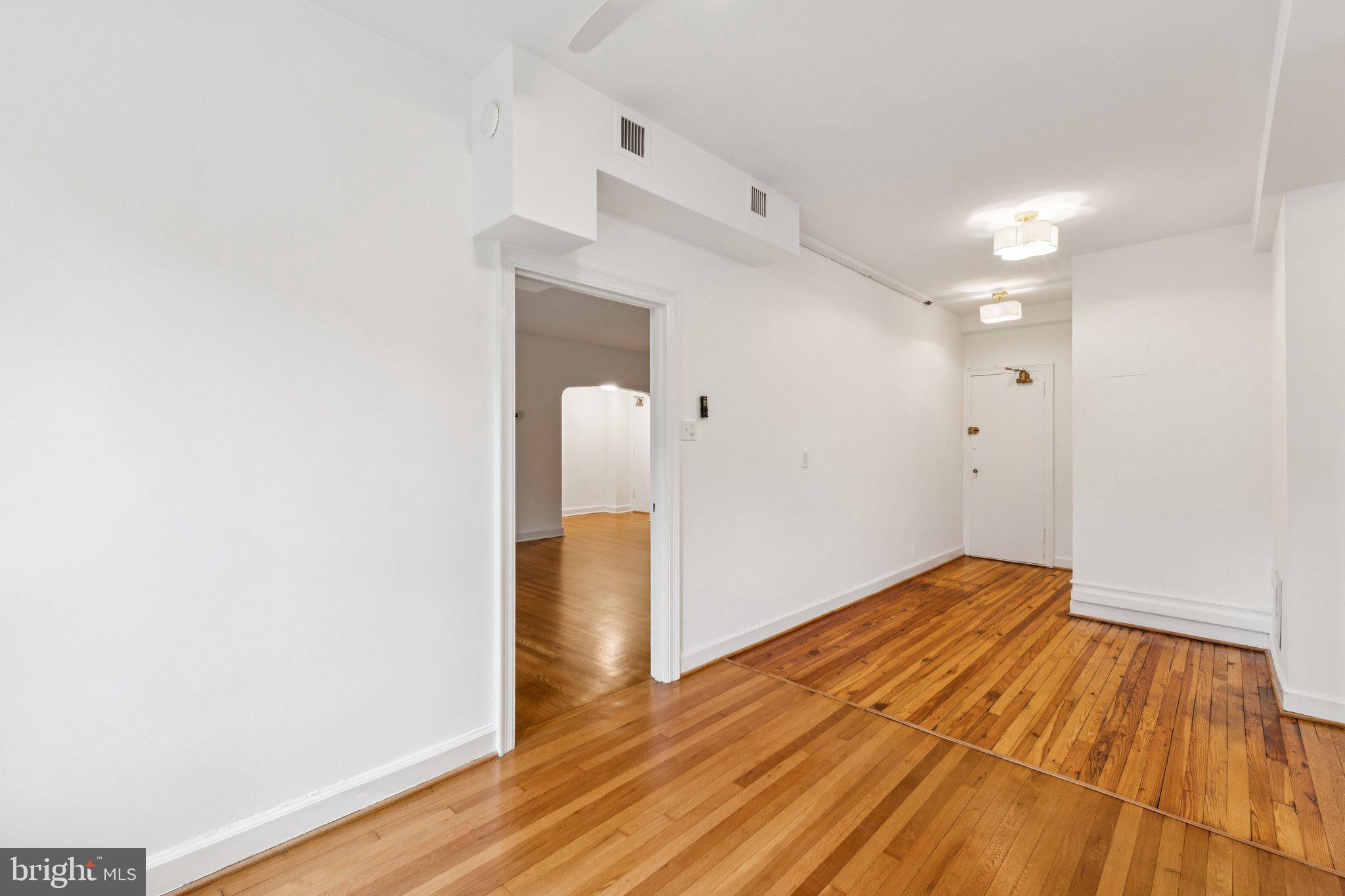 4707 Connecticut Avenue Northwest, Unit 211 & 213 Washington, DC 20008 - Photo 17 of 43 Middle Entrance to Mudroom/Office