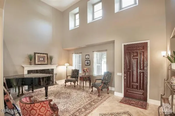 a view of a livingroom with furniture and window