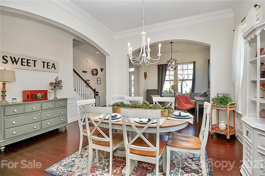 86523 Arrington Road Lancaster, SC 29720 - Photo 11 of 43 a view of a dining room with furniture and chandelier