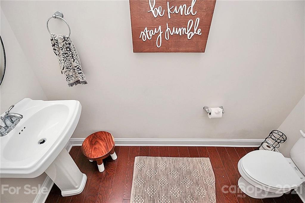 86523 Arrington Road Lancaster, SC 29720 - Photo 20 of 43 a bathroom with a toilet and a sink