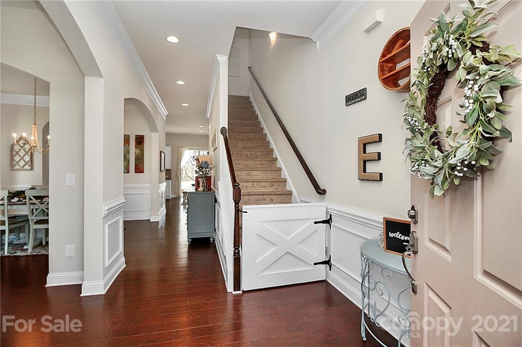 86523 Arrington Road Lancaster, SC 29720 - Photo 21 of 43 a view of entryway with wooden floor and stairs