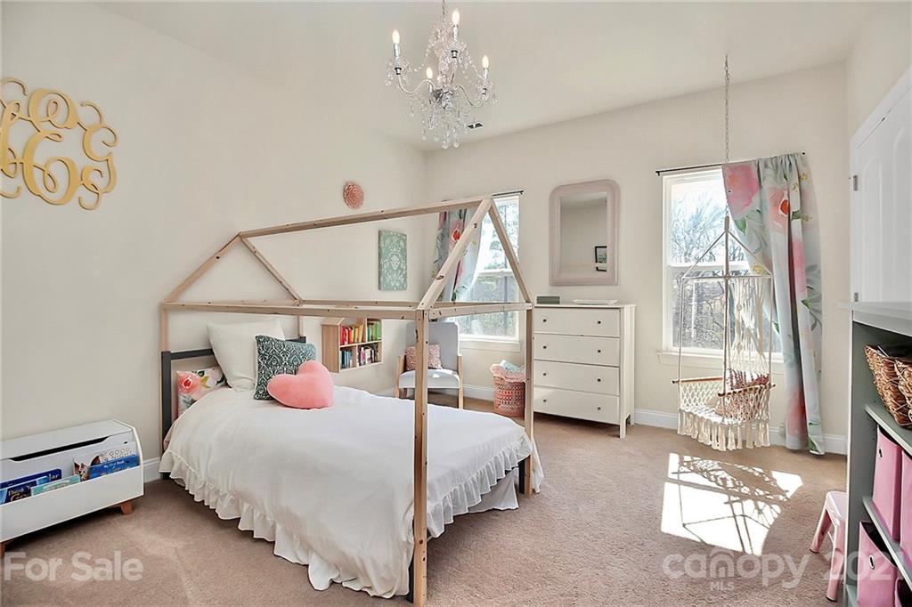86523 Arrington Road Lancaster, SC 29720 - Photo 25 of 43 a bedroom with a bed a window and dresser