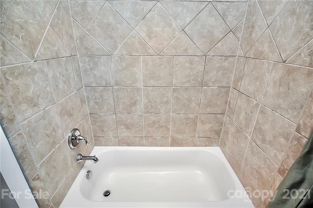 86523 Arrington Road Lancaster, SC 29720 - Photo 28 of 43 a bathroom with a bathtub