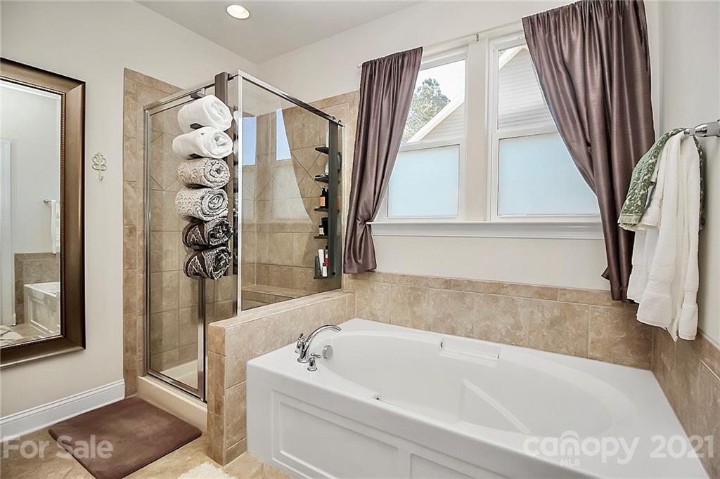 86523 Arrington Road Lancaster, SC 29720 - Photo 36 of 43 a bathroom with a bathtub a toilet and a shower