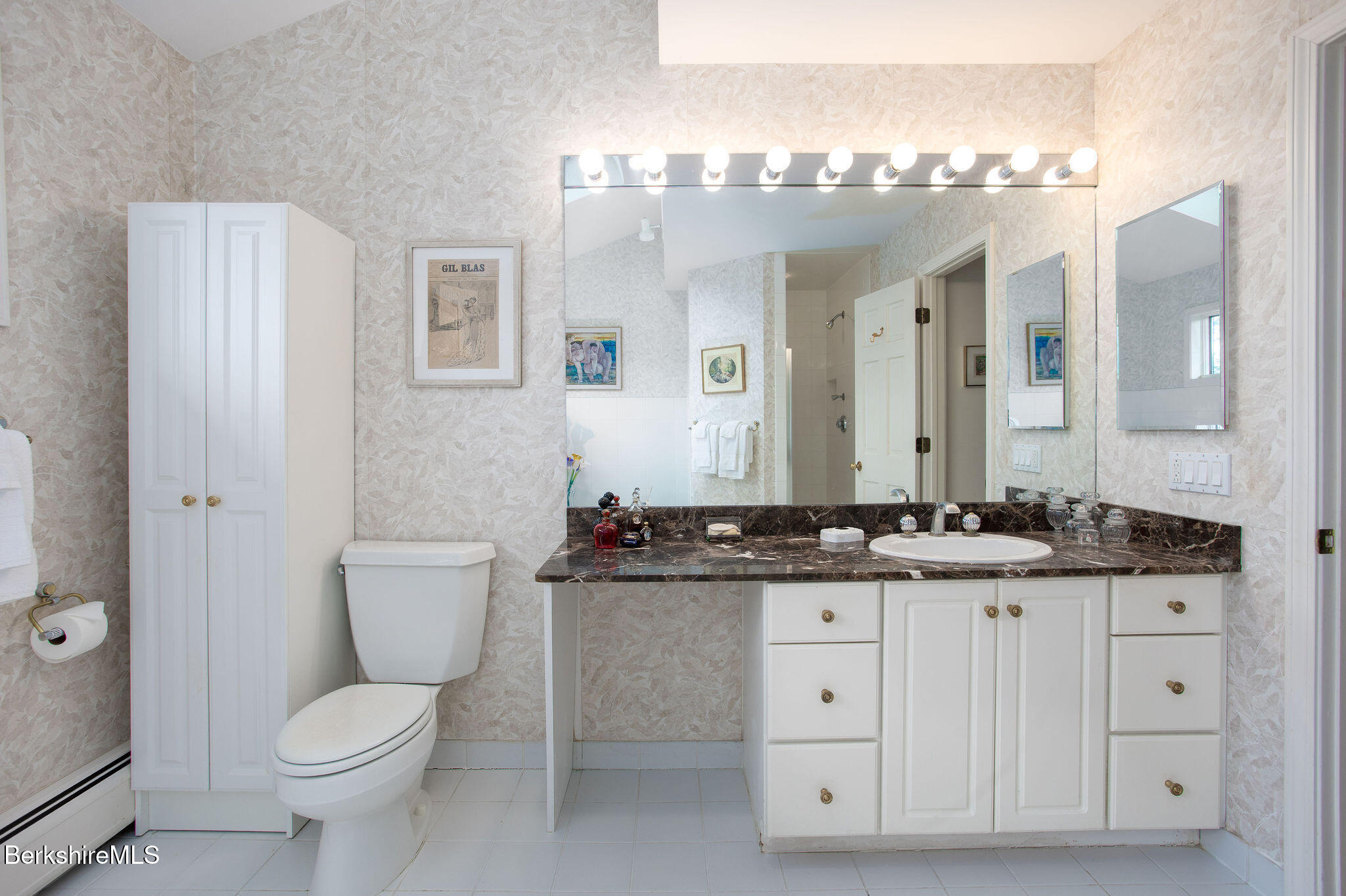 77 Hurlburt Road Great Barrington, MA 01230 - Photo 31 of 48 a bathroom with a granite countertop toilet sink and mirror