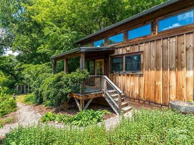 a view of balcony with furniture
