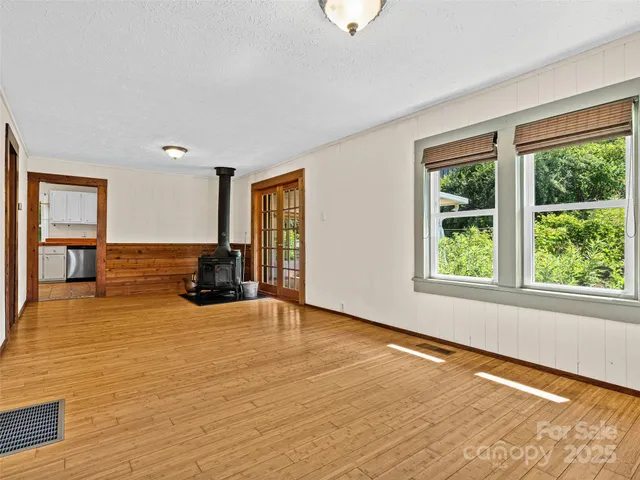 a view of a kitchen with a sink and a stove