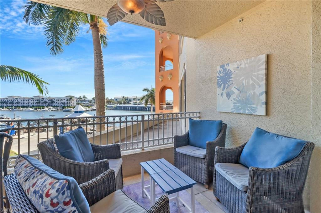 450 Bayfront Place, Unit 4206 Naples, FL 34102 - Photo 18 of 27 a balcony with furniture