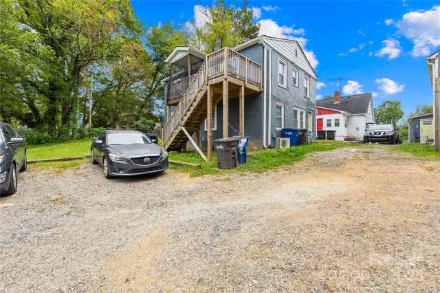 a car parked in front of a house
