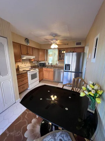 a bedroom with bed and window