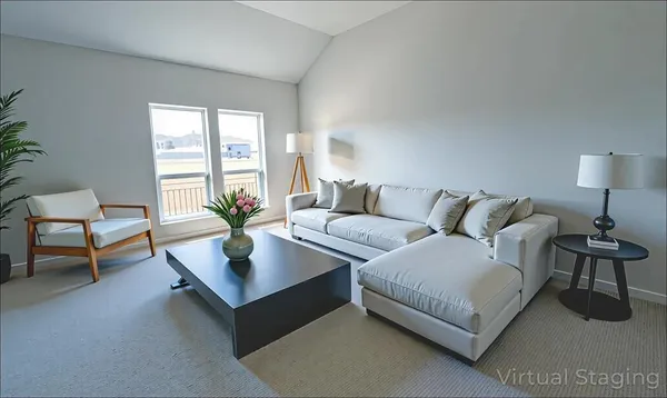 a living room with furniture and a lamp