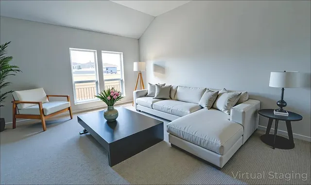 a living room with furniture and a lamp