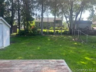 a garden view with a seating space