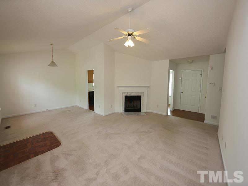 1620 Middle Ridge Drive Willow Spring, NC 27592 - Photo 3 of 25 Good sized family room with angled fireplace!