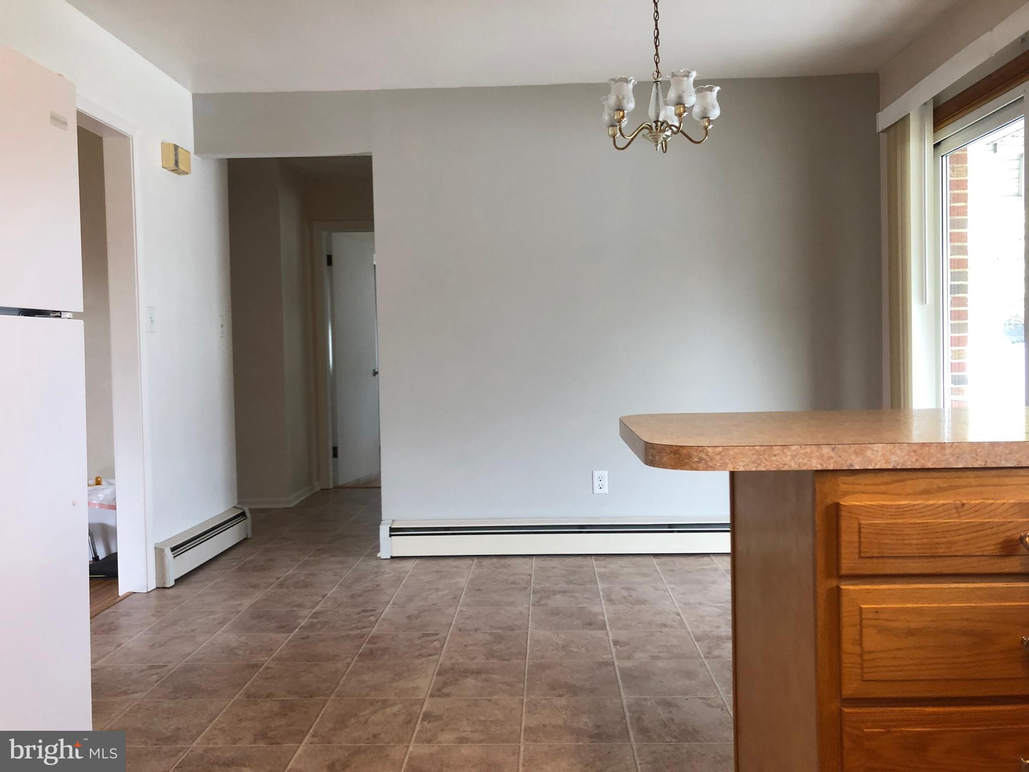 8459 Geneva Road Pasadena, MD 21122 - Photo 6 of 16 Dining Area