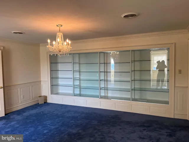 a view of a livingroom with a chandelier