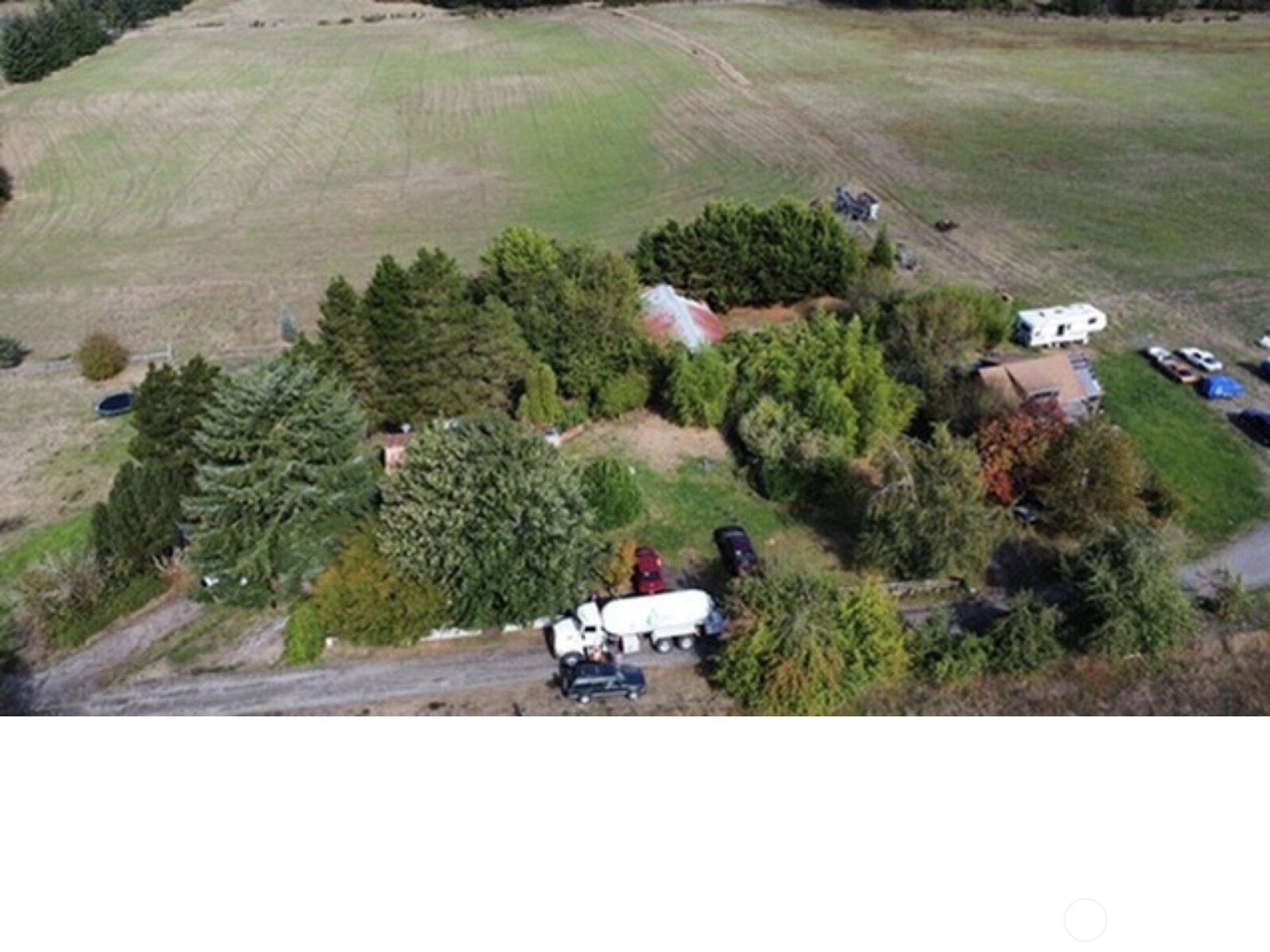 18430 Northcraft Road Southeast Tenino, WA 98589 - Photo 4 of 6 a black and white photo of a house