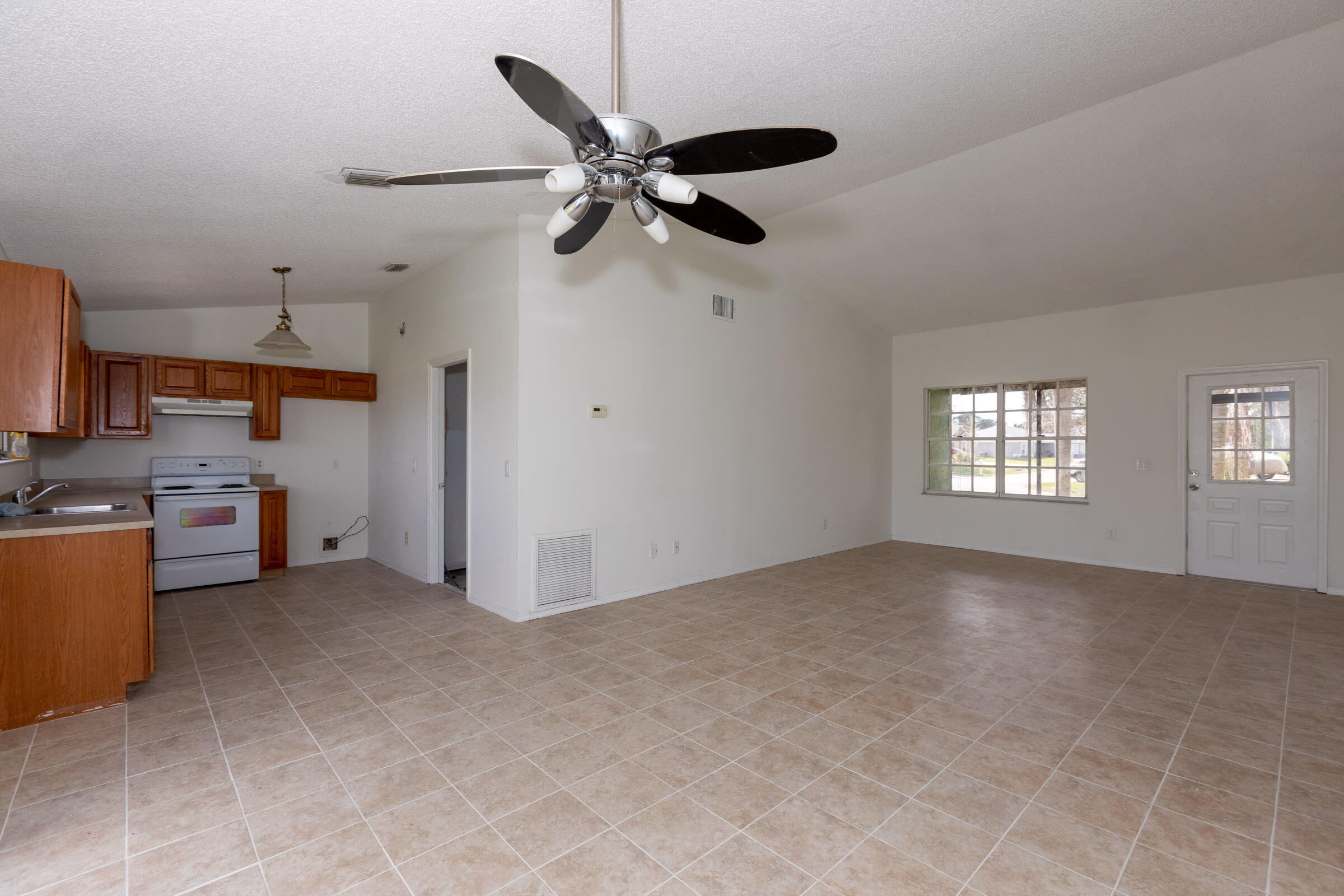 2825 Southwest Pierson Road Port St. Lucie, FL 34953 - Photo 14 of 24 Kitchen and living room