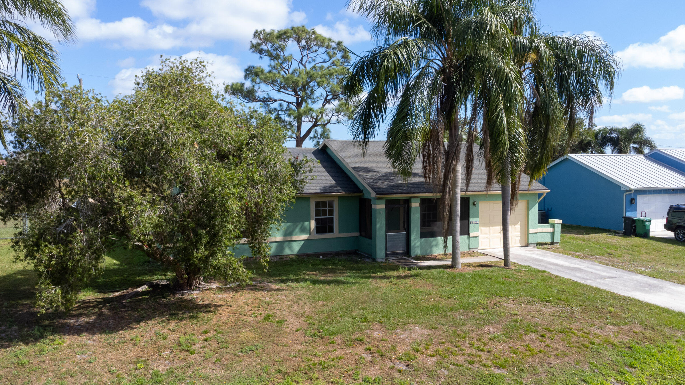 2825 Southwest Pierson Road Port St. Lucie, FL 34953 - Photo 2 of 24 Front 2