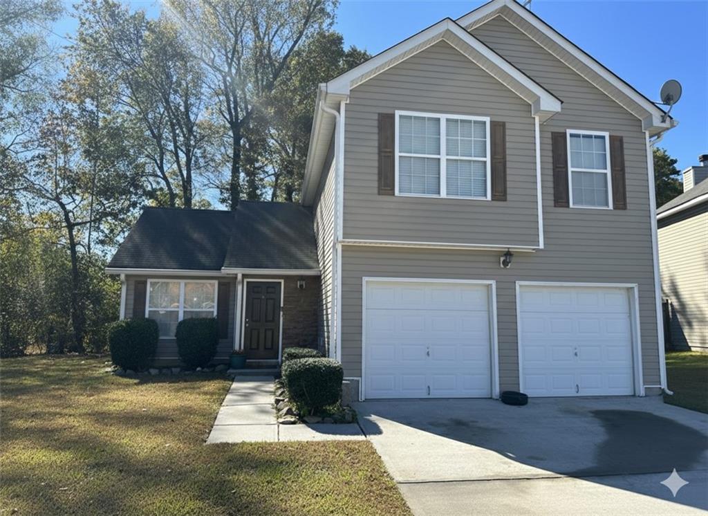 8258 Champion Trail Fairburn, GA 30213 - Photo 1 of 7 a view of house with outdoor space