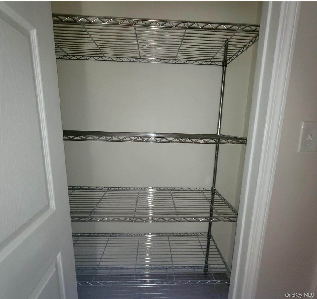 49 Azalea Road Levittown, NY 11756 - Photo 8 of 17 a view of walk in closet