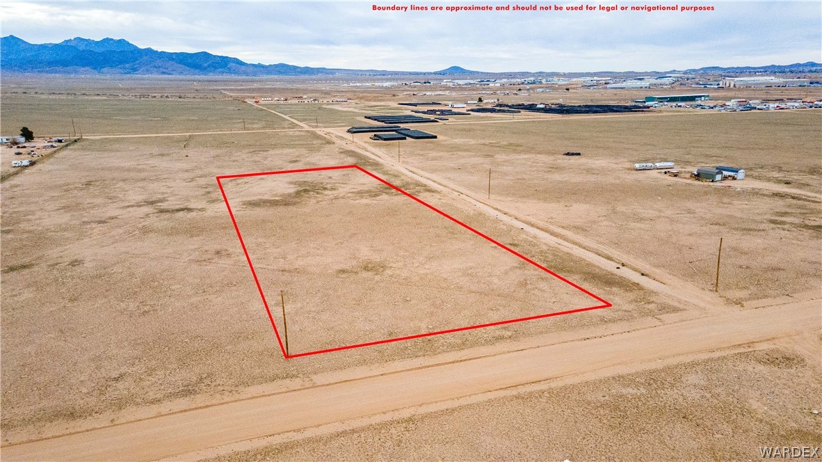Expansive parcel featuring clear, undeveloped land and visible road frontage