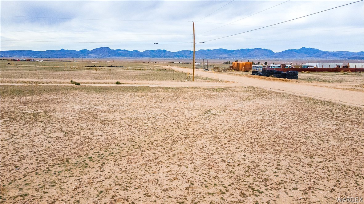 0 East Parker Road, Unit 119 Kingman, AZ 86401 - Photo 12 of 16 Expansive with a dirt road and distant mountains