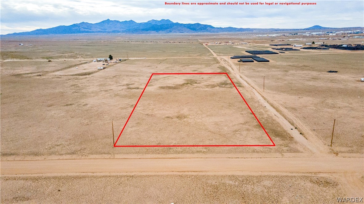 0 East Parker Road, Unit 119 Kingman, AZ 86401 - Photo 3 of 16 Expansive undeveloped land parcel with desert vegetation