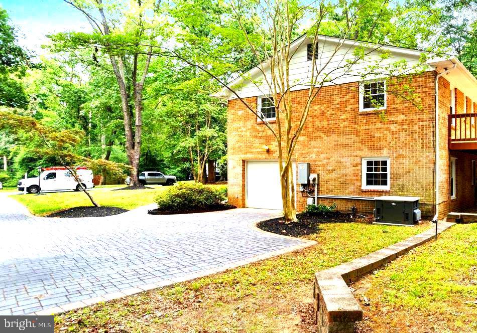 176 Cardamon Drive Edgewater, MD 21037 - Photo 4 of 42 Large 1 Car Garage with Beautiful Paver Driveway