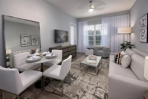 a living room with furniture fireplace and a flat screen tv