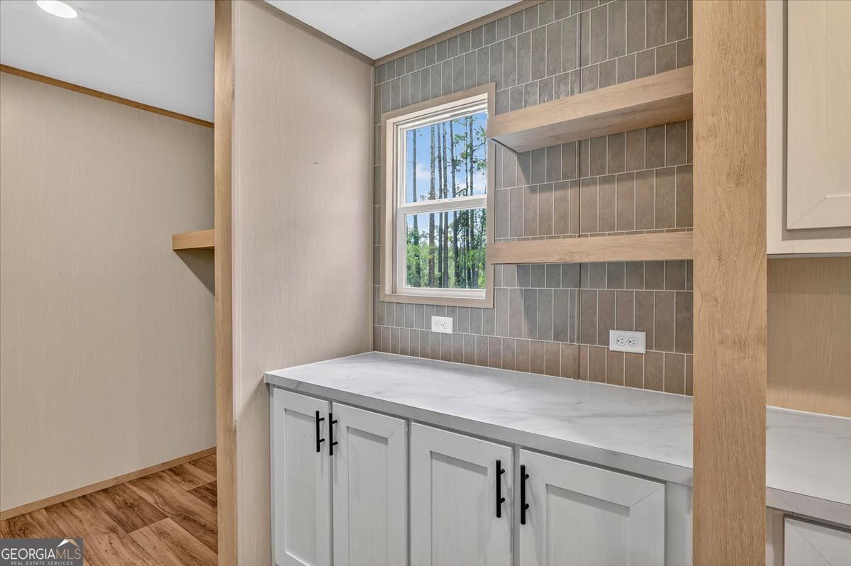 29 Clyde Road White Oak, GA 31568 - Photo 12 of 46 a room with a sink and a window