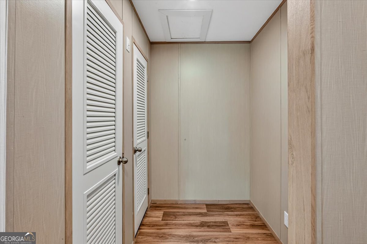 29 Clyde Road White Oak, GA 31568 - Photo 31 of 46 a view of a hallway with wooden floor and entryway