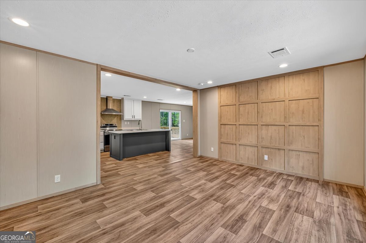29 Clyde Road White Oak, GA 31568 - Photo 9 of 46 a view of a kitchen with a sink and a stove top oven