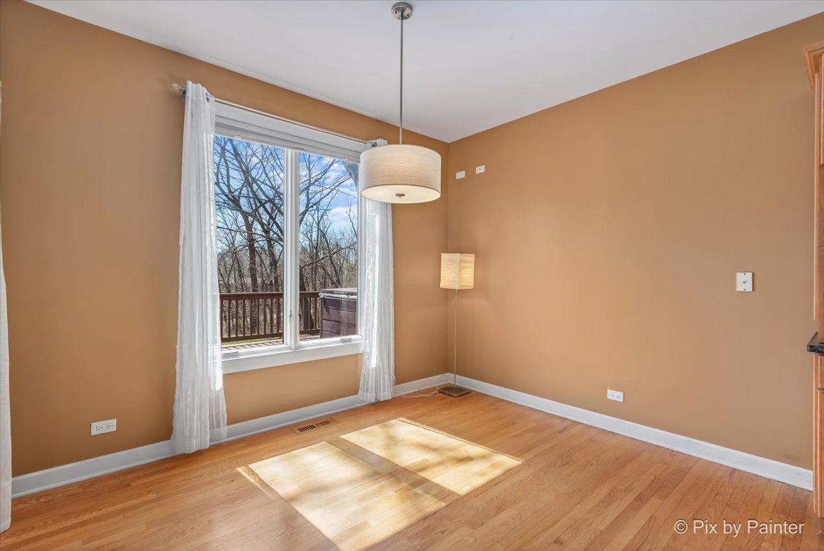 28935 Fox Street Cary, IL 60013 - Photo 23 of 50 a view of a room with window and wooden floor