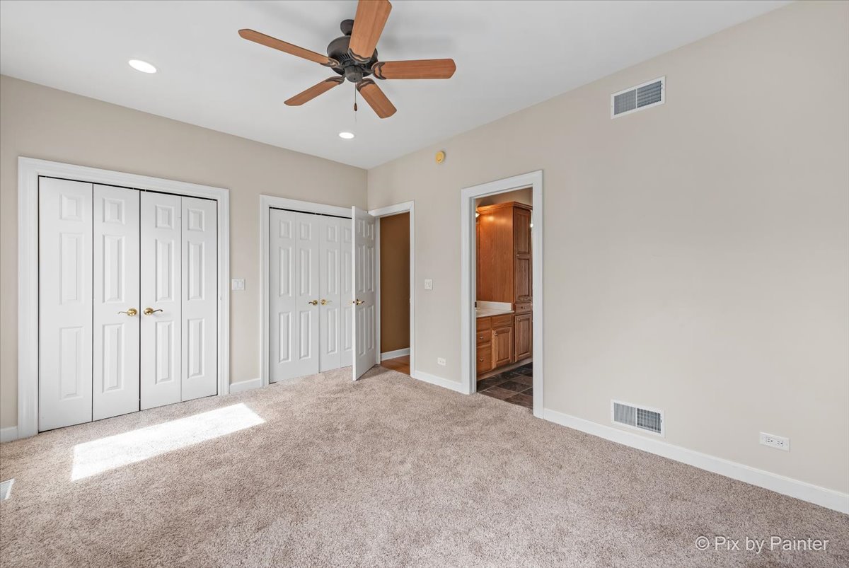 28935 Fox Street Cary, IL 60013 - Photo 27 of 50 an empty room with closet and a ceiling fan