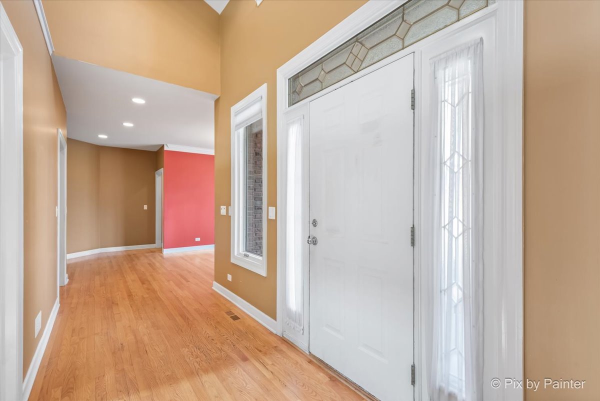 28935 Fox Street Cary, IL 60013 - Photo 3 of 50 a view of hallway with wooden floor